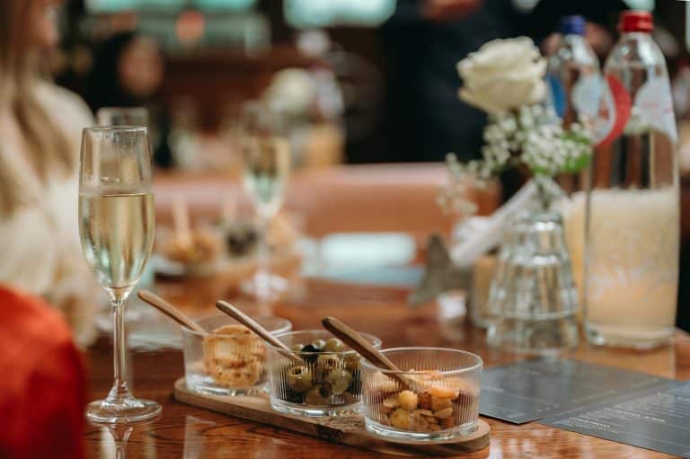 Olives, nuts and cheese cookies display aboard canal cruise boat